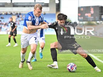 Besart Topalloi (23 Bromley) is challenged by Harry Anderson (7 Colchester United) during the Sky Bet League 2 match between Colchester Unit...