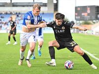 Besart Topalloi (23 Bromley) is challenged by Harry Anderson (7 Colchester United) during the Sky Bet League 2 match between Colchester Unit...