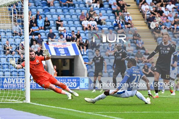 Owura Edwards (21 Colchester United) scores the first goal for the team, making it 1-1, during the Sky Bet League 2 match between Colchester...