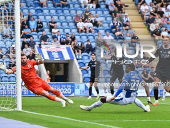 Owura Edwards (21 Colchester United) scores the first goal for the team, making it 1-1, during the Sky Bet League 2 match between Colchester...