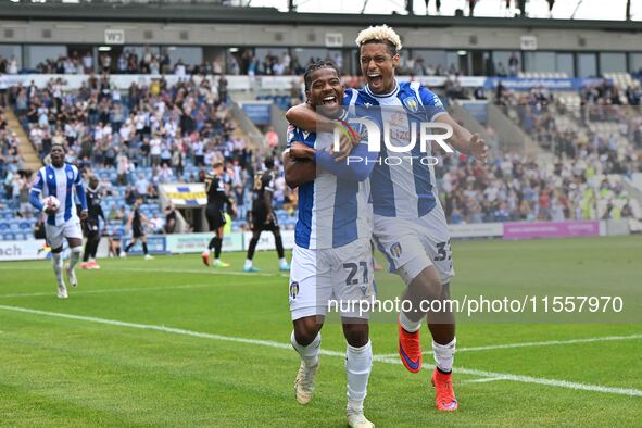 Owura Edwards (21 Colchester United) celebrates his goal with Lyle Taylor (33 Colchester United) during the Sky Bet League 2 match between C...