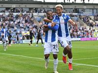 Owura Edwards (21 Colchester United) celebrates his goal with Lyle Taylor (33 Colchester United) during the Sky Bet League 2 match between C...