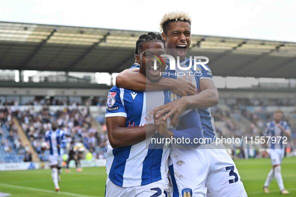 Owura Edwards (21, Colchester United) celebrates with Lyle Taylor (33, Colchester United) his first goal, making the score 1-1, during the S...