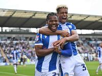 Owura Edwards (21, Colchester United) celebrates with Lyle Taylor (33, Colchester United) his first goal, making the score 1-1, during the S...