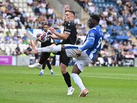 Deji Elerewe (3 Bromley) challenges Samson Tovide (9 Colchester United) during the Sky Bet League 2 match between Colchester United and Brom...