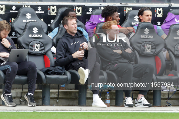 Milton Keynes Dons manager Michael Williamson and Dean Lewington before the Sky Bet League 2 match between MK Dons and Walsall at Stadium MK...