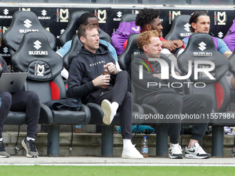 Milton Keynes Dons manager Michael Williamson and Dean Lewington before the Sky Bet League 2 match between MK Dons and Walsall at Stadium MK...