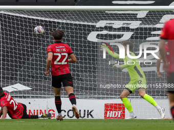 Callum Hendry finds the back of the net for Milton Keynes Dons to take the lead, making it 1-0 against Walsall, during the first half of the...