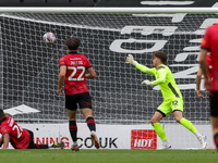 Callum Hendry finds the back of the net for Milton Keynes Dons to take the lead, making it 1-0 against Walsall, during the first half of the...