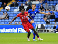 Charlie Raglan of Oldham Athletic Association Football Club tussles with Aribim Pepple of Southend United Football Club during the Vanarama...