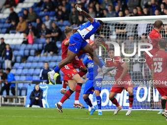 Mike Fondop of Oldham Athletic Association Football Club heads for goal during the Vanarama National League match between Oldham Athletic an...