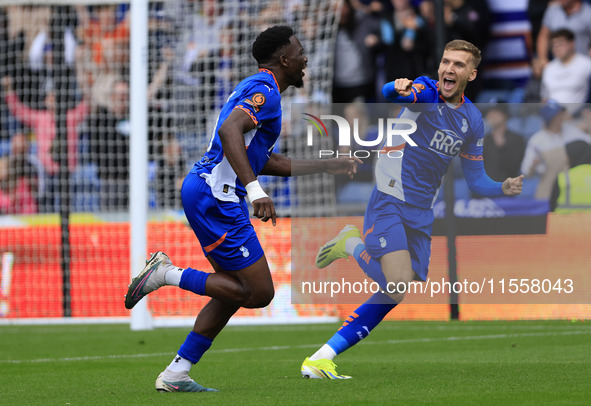 Mike Fondop of Oldham Athletic Association Football Club celebrates scoring his side's first goal of the game during the Vanarama National L...