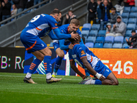 Mike Fondop of Oldham Athletic celebrates scoring his side's equalizer during the Vanarama National League match between Oldham Athletic and...