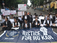 Law students give slogans protesting over the sexual assault and murder of a postgraduate woman doctor in Kolkata, India, on September 8, 20...