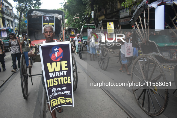 Hand-pulled rickshaw drivers protest over the sexual assault and murder of a postgraduate woman doctor in Kolkata, India, on September 8, 20...