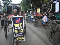 Hand-pulled rickshaw drivers protest over the sexual assault and murder of a postgraduate woman doctor in Kolkata, India, on September 8, 20...