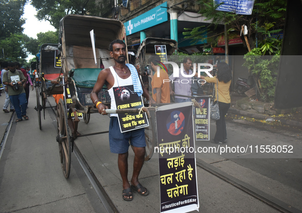 Hand-pulled rickshaw drivers protest over the sexual assault and murder of a postgraduate woman doctor in Kolkata, India, on September 8, 20...