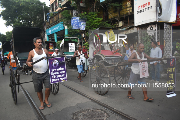 Hand-pulled rickshaw drivers protest over the sexual assault and murder of a postgraduate woman doctor in Kolkata, India, on September 8, 20...