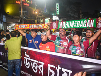 Supporters of East Bengal and Mohan Bagan club protest over the sexual assault and murder of a postgraduate woman doctor in Kolkata, India,...