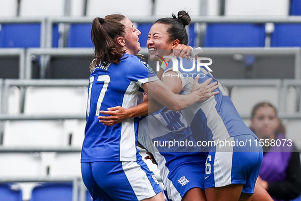 #17, Lucy Quinn of Birmingham hugs #26, Choe Yu-Ri as they celebrate her goal to make it 3-0 during the FA Women's Championship match betwee...