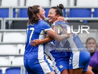 #17, Lucy Quinn of Birmingham hugs #26, Choe Yu-Ri as they celebrate her goal to make it 3-0 during the FA Women's Championship match betwee...