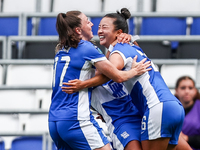 #17, Lucy Quinn of Birmingham hugs #26, Choe Yu-Ri as they celebrate her goal to make it 3-0 during the FA Women's Championship match betwee...