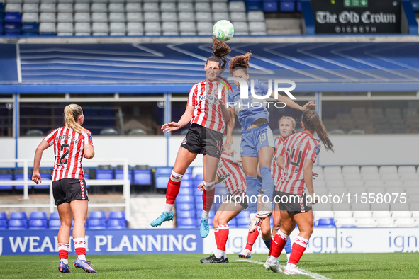 Amy Goddard of Sunderland and Tegan McGowan of Birmingham battle in the air during the FA Women's Championship match between Birmingham City...