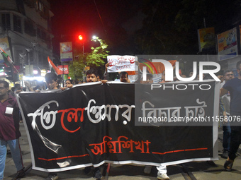 People protest over the sexual assault and murder of a postgraduate woman doctor in Kolkata, India, on September 8, 2024. (