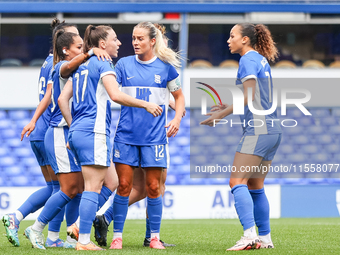 Lucy Quinn of Birmingham celebrates scoring from the penalty spot with her teammates during the FA Women's Championship match between Birmin...