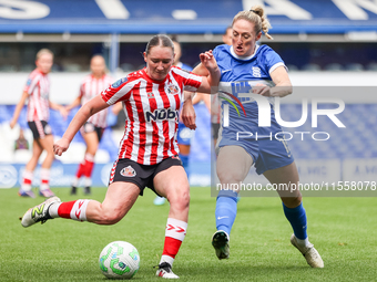 Amy Goddard of Sunderland is pressured by Rebecca Holloway of Birmingham during the FA Women's Championship match between Birmingham City an...