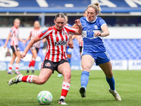 Amy Goddard of Sunderland is pressured by Rebecca Holloway of Birmingham during the FA Women's Championship match between Birmingham City an...