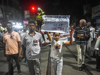 People protest over the sexual assault and murder of a postgraduate woman doctor in Kolkata, India, on September 8, 2024. (