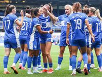 #13, Ivana Fuso of Birmingham, is congratulated by #30, Neve Herron (center hand raised) during the FA Women's Championship match between Bi...