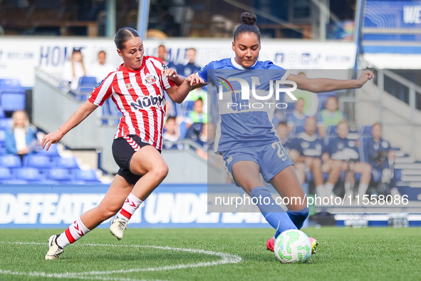 #18, Libby McInnes of Sunderland challenges #21, Ashanti Akpan of Birmingham during the FA Women's Championship match between Birmingham Cit...