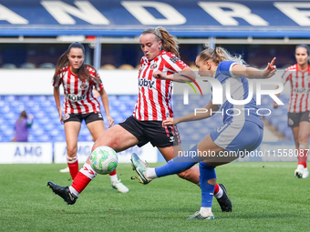 #23, Charlie Devlin of Birmingham, attacks as #11, Jessica Brown of Sunderland, moves to intercept during the FA Women's Championship match...