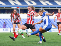 #23, Charlie Devlin of Birmingham, attacks as #11, Jessica Brown of Sunderland, moves to intercept during the FA Women's Championship match...