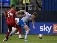 Rory Feely of Barrow battles for possession with Grant Hall of Swindon Town during the Sky Bet League 2 match between Barrow and Swindon Tow...