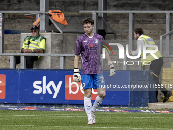 Barrow's Rory Feely takes over in goal after Paul Farman is sent off during the Sky Bet League 2 match between Barrow and Swindon Town at Ho...