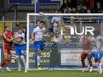 Barrow's Dean Campbell heads clear from defense during the Sky Bet League 2 match between Barrow and Swindon Town at Holker Street in Barrow...