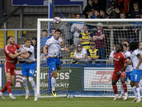 Barrow's Dean Campbell heads clear from defense during the Sky Bet League 2 match between Barrow and Swindon Town at Holker Street in Barrow...