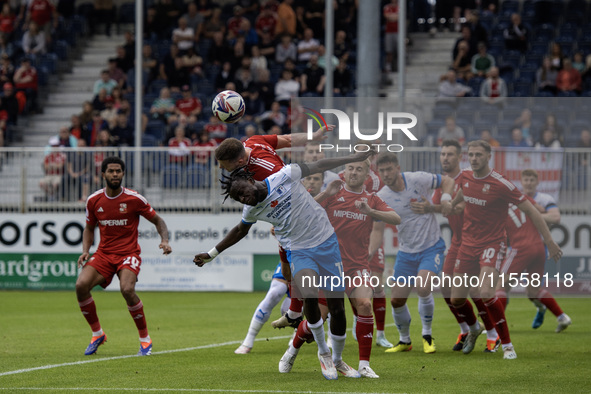 Barrow's Katia Kouyate puts the Swindon defense under pressure during the Sky Bet League 2 match between Barrow and Swindon Town at Holker S...