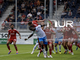 Barrow's Katia Kouyate puts the Swindon defense under pressure during the Sky Bet League 2 match between Barrow and Swindon Town at Holker S...