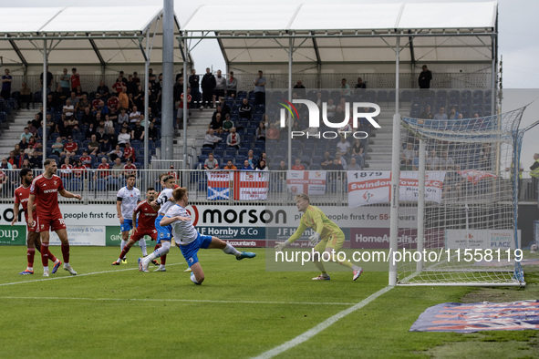 Ged Garner of Barrow chips wide of the goal during the Sky Bet League 2 match between Barrow and Swindon Town at Holker Street in Barrow-in-...