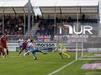 Ged Garner of Barrow chips wide of the goal during the Sky Bet League 2 match between Barrow and Swindon Town at Holker Street in Barrow-in-...