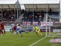 Ged Garner of Barrow chips wide of the goal during the Sky Bet League 2 match between Barrow and Swindon Town at Holker Street in Barrow-in-...