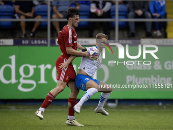 Andrew Dallas of Barrow in action during the Sky Bet League 2 match between Barrow and Swindon Town at Holker Street in Barrow-in-Furness, E...