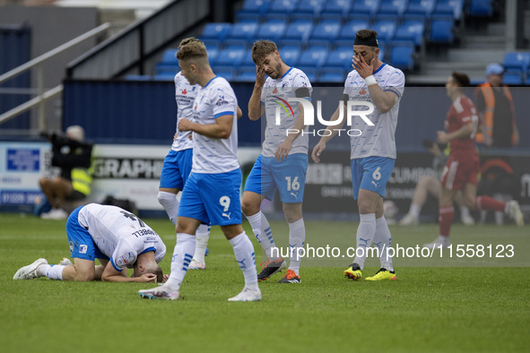 Barrow's players react after Swindon equalizes in the 98th minute of the Sky Bet League 2 match between Barrow and Swindon Town at Holker St...