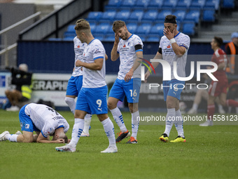 Barrow's players react after Swindon equalizes in the 98th minute of the Sky Bet League 2 match between Barrow and Swindon Town at Holker St...