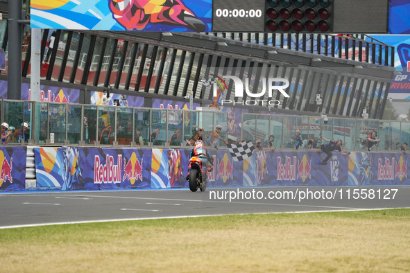 Ogura Ai wins under the finish flag during the Gran Premio Red Bull di San Marino e della Riviera di Rimini Grand Prix Race MotoGP on Sunday...