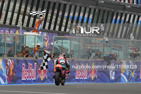 Ogura Ai wins under the finish flag during the Gran Premio Red Bull di San Marino e della Riviera di Rimini Grand Prix Race MotoGP on Sunday...